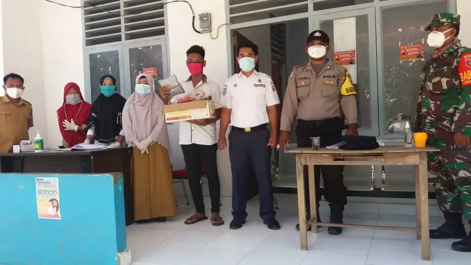 Pemuda Desa Lagundi Mendonasikan Masker