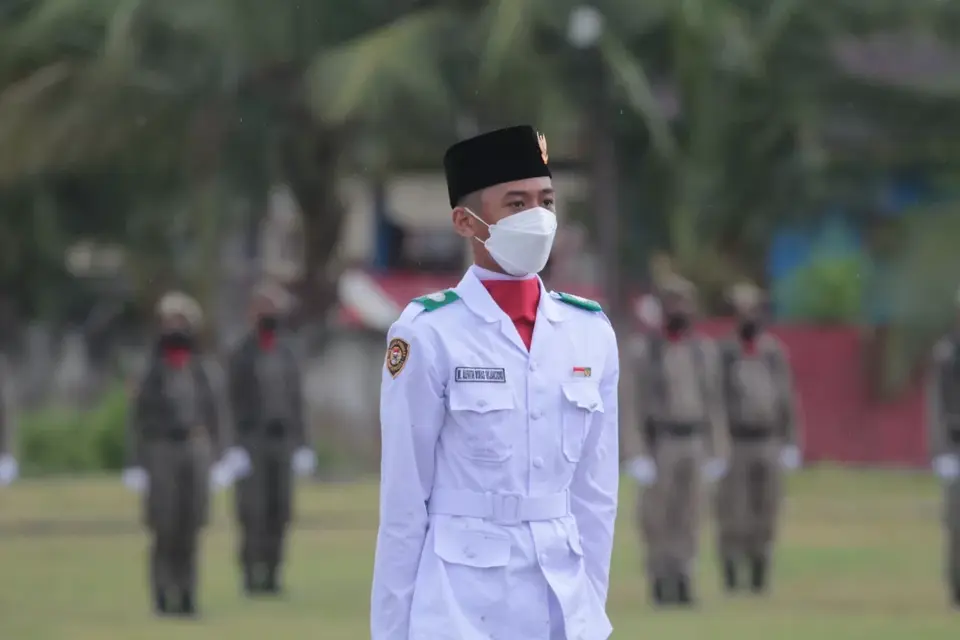 Kisah Sukses Muhammad Alfatih Dimas Witjaksono Kibarkan Merah Putih. Seabrek Ekskul, dari Pembentang jadi Pengerek